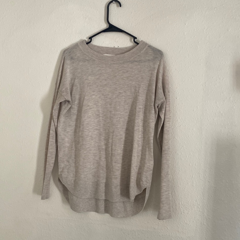 H&M cream colored sweater.